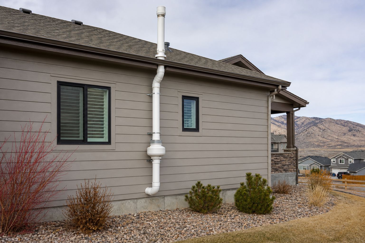 Radon mitigation system exterior installation in Lone Tree, Colorado
